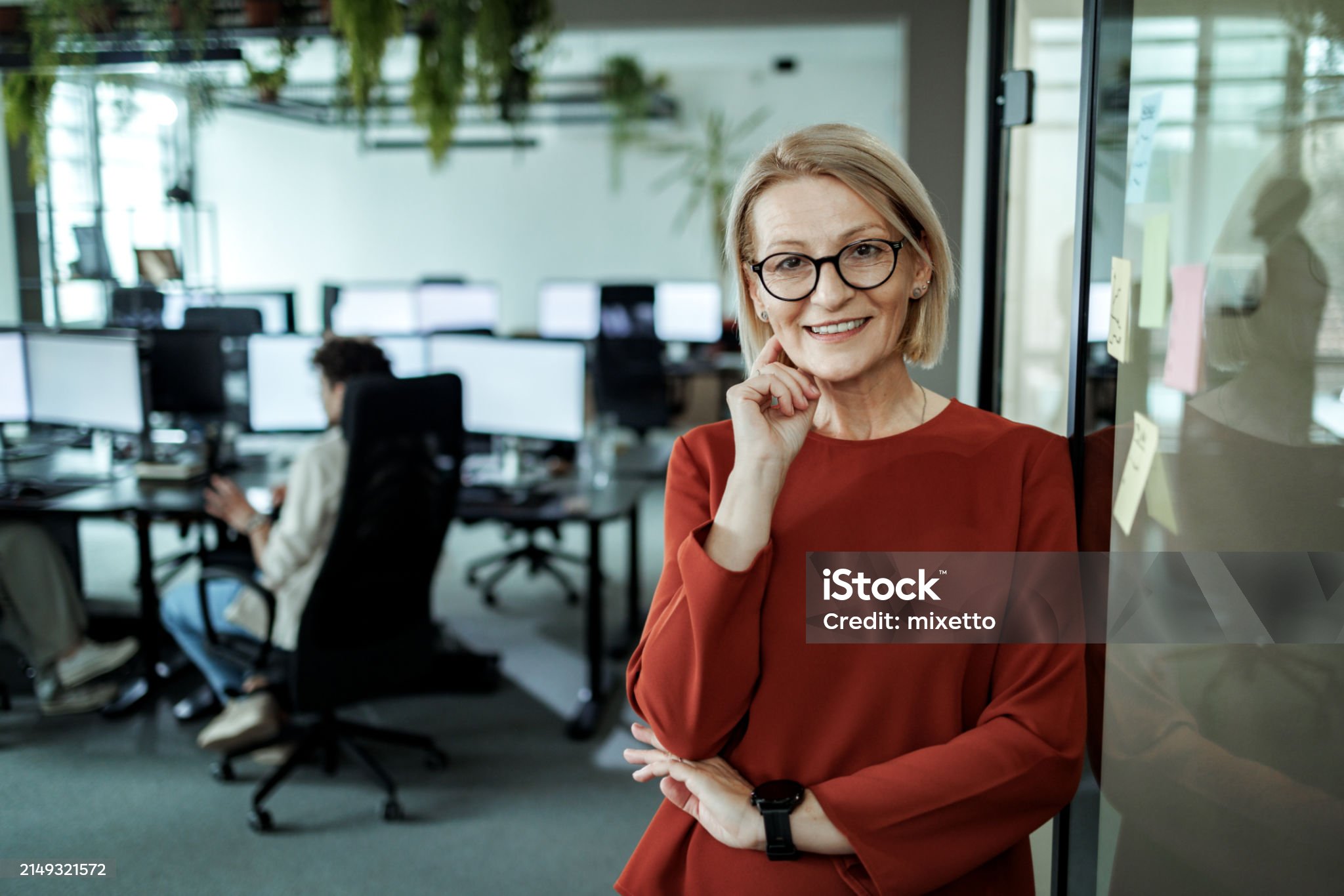 Mature businesswoman posing for a shot at the modern office